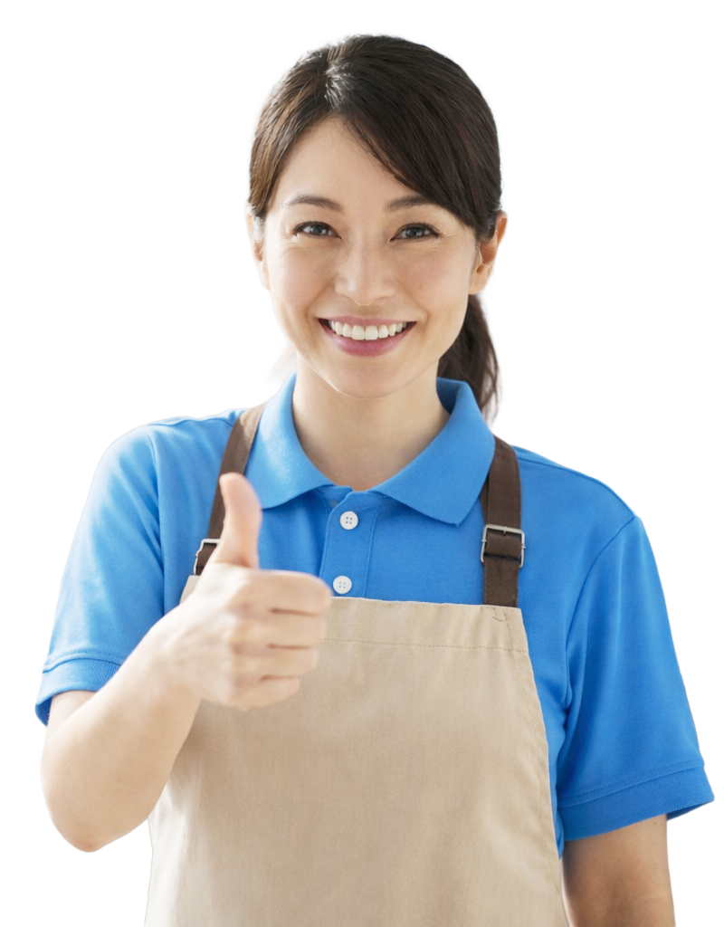 笑顔で親指を立てるスタッフ